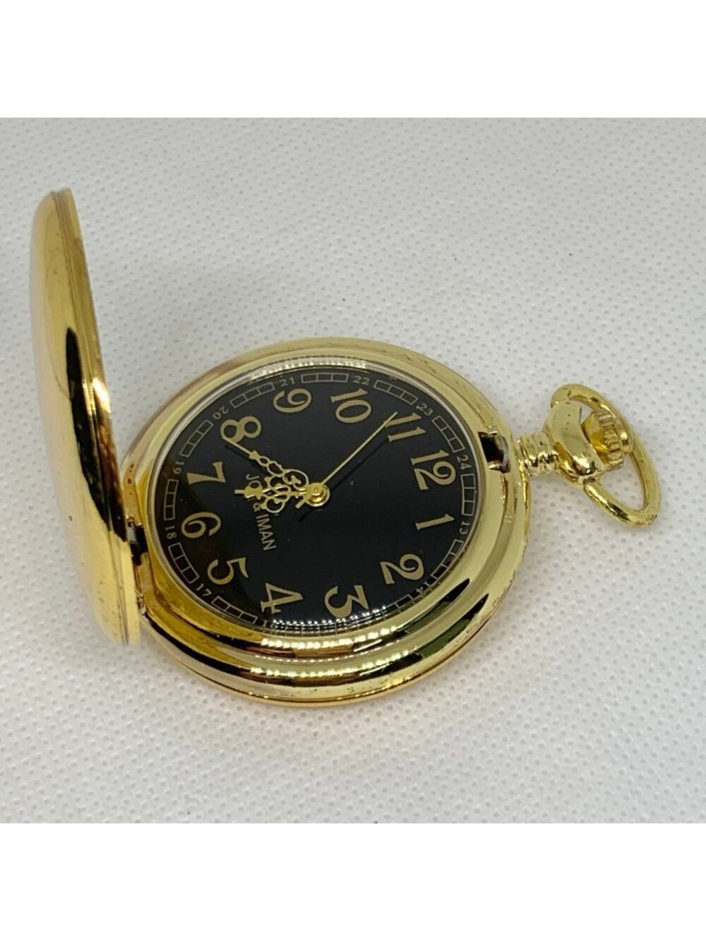 Joy & iman gold tone pocket watch black dial quartz analog 46mm running